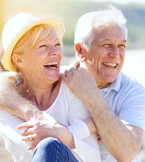 senior man and woman smiling